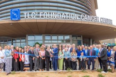 Front-Ribbon-Cutting-Group